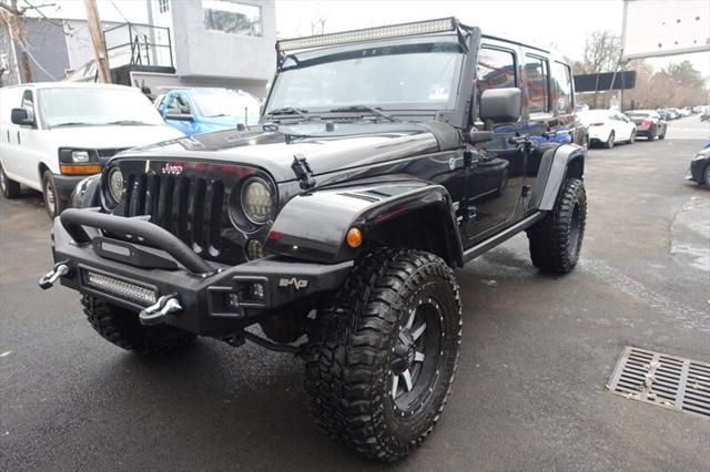 used 2011 Jeep Wrangler Unlimited car, priced at $8,988