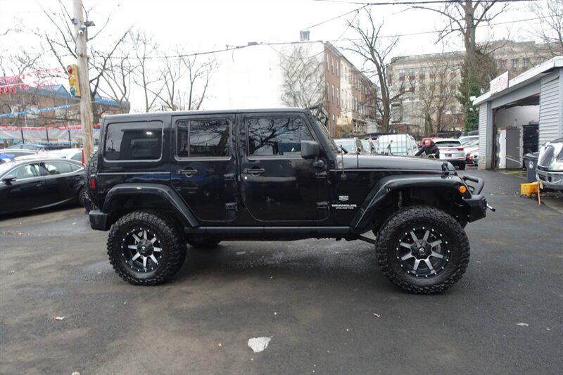 used 2011 Jeep Wrangler Unlimited car, priced at $8,488