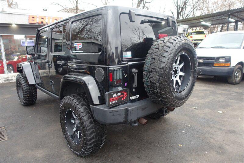 used 2011 Jeep Wrangler Unlimited car, priced at $8,488