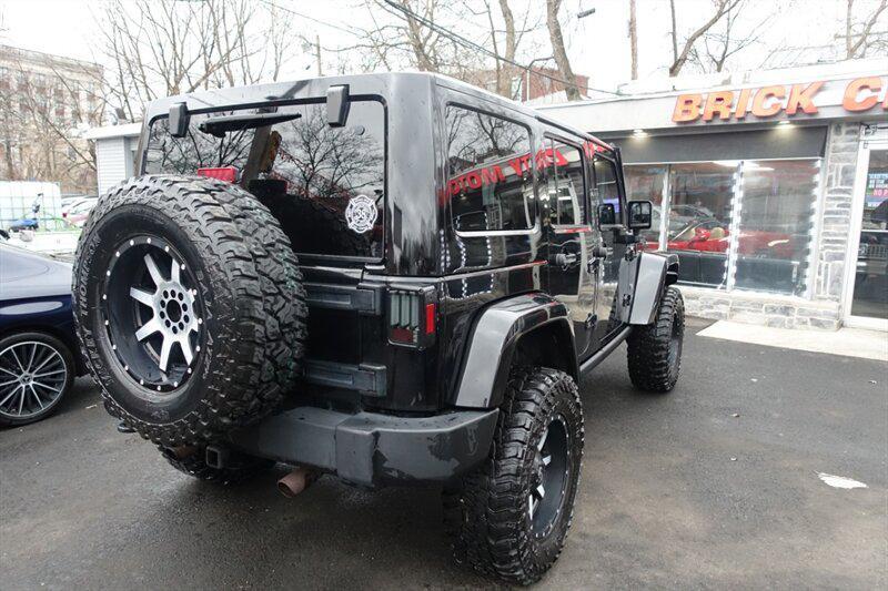used 2011 Jeep Wrangler Unlimited car, priced at $8,488