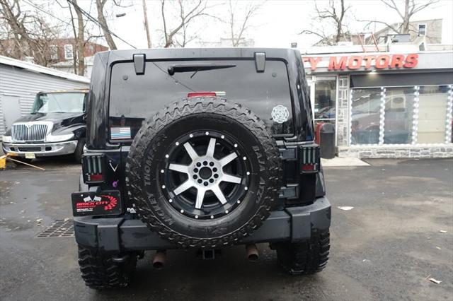 used 2011 Jeep Wrangler Unlimited car, priced at $8,988