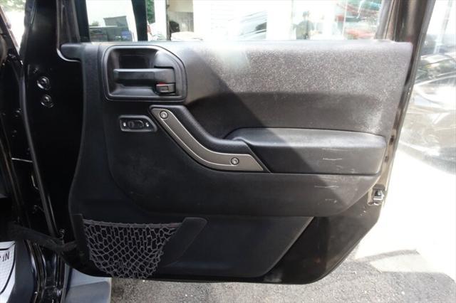used 2016 Jeep Wrangler Unlimited car, priced at $10,488