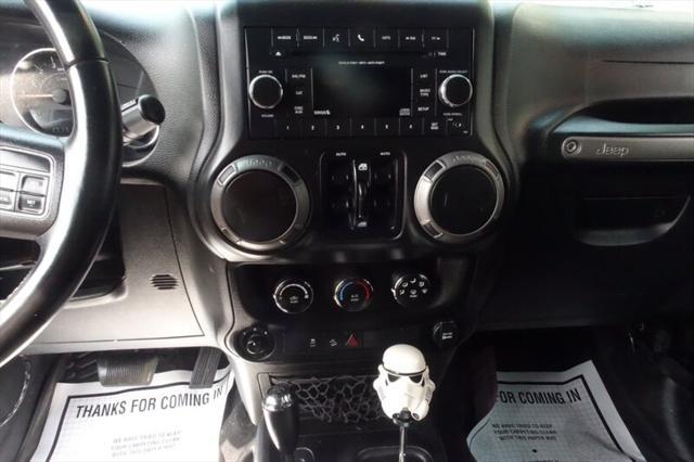used 2016 Jeep Wrangler Unlimited car, priced at $10,488