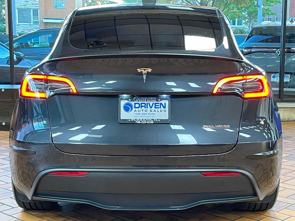 used 2024 Tesla Model Y car, priced at $34,980