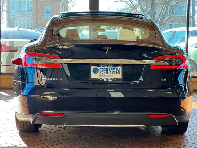 used 2014 Tesla Model S car, priced at $13,980