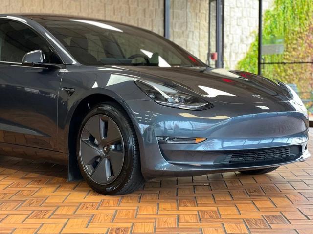 used 2023 Tesla Model 3 car, priced at $26,980