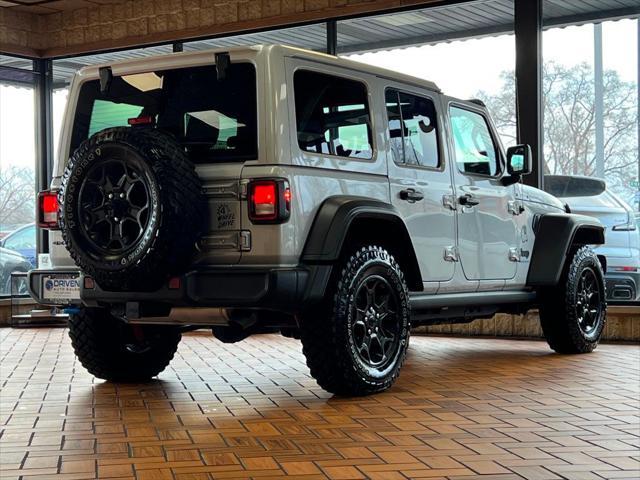 used 2023 Jeep Wrangler 4xe car, priced at $37,979