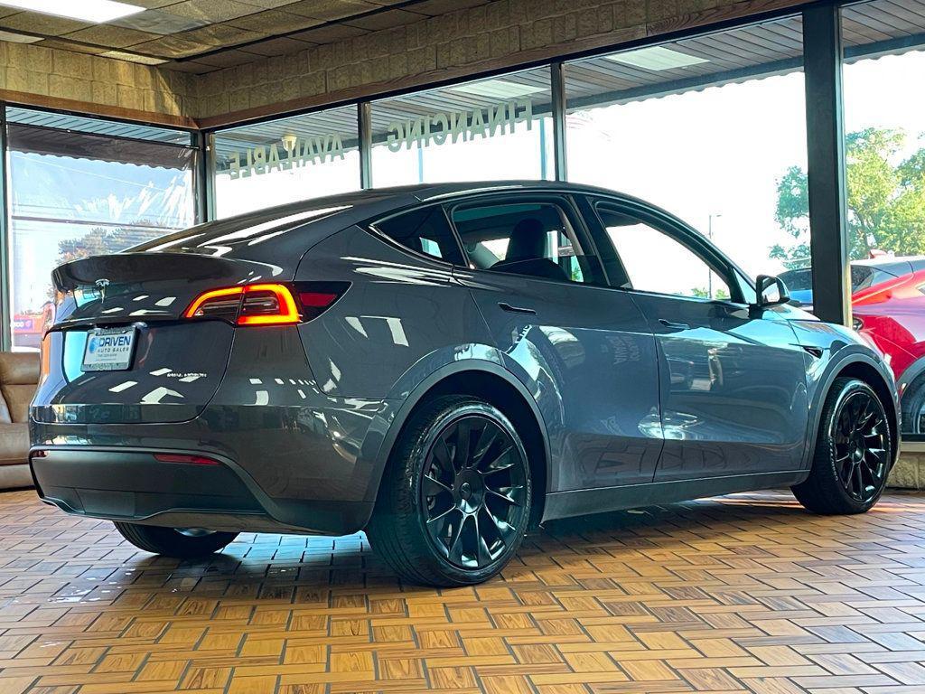 used 2023 Tesla Model Y car, priced at $29,980