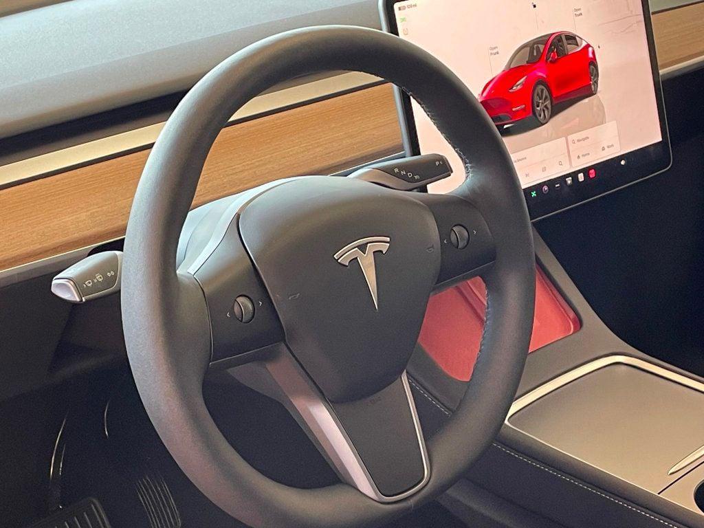 used 2024 Tesla Model Y car, priced at $34,980