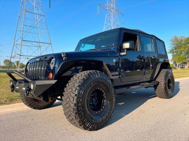 used 2013 Jeep Wrangler Unlimited car, priced at $14,980