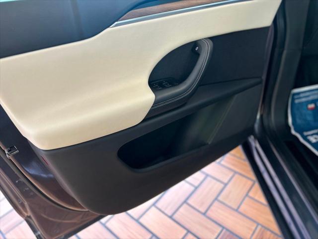 used 2023 Tesla Model X car, priced at $53,980