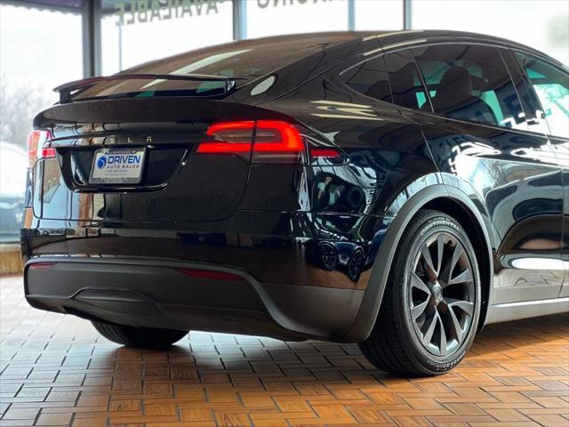 used 2023 Tesla Model X car, priced at $56,980