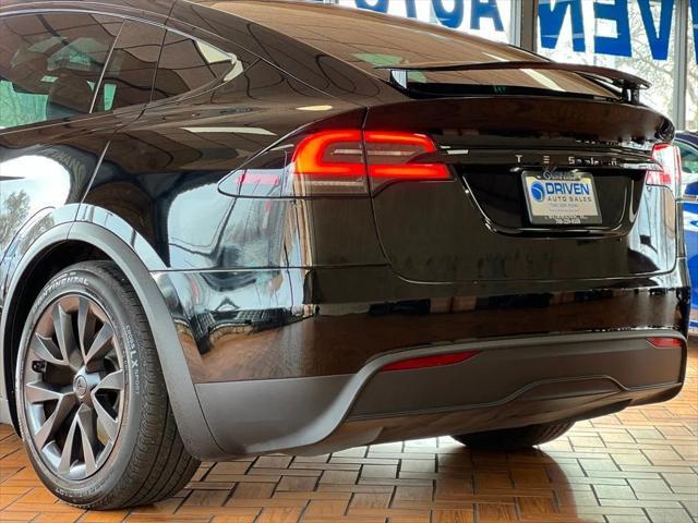 used 2023 Tesla Model X car, priced at $56,980