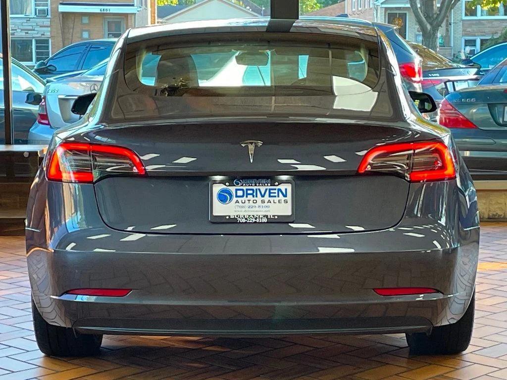 used 2023 Tesla Model 3 car, priced at $23,980