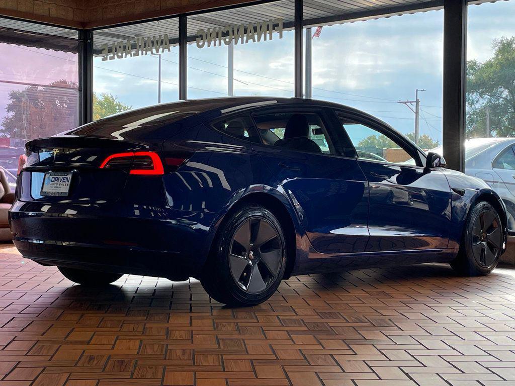 used 2023 Tesla Model 3 car, priced at $23,980