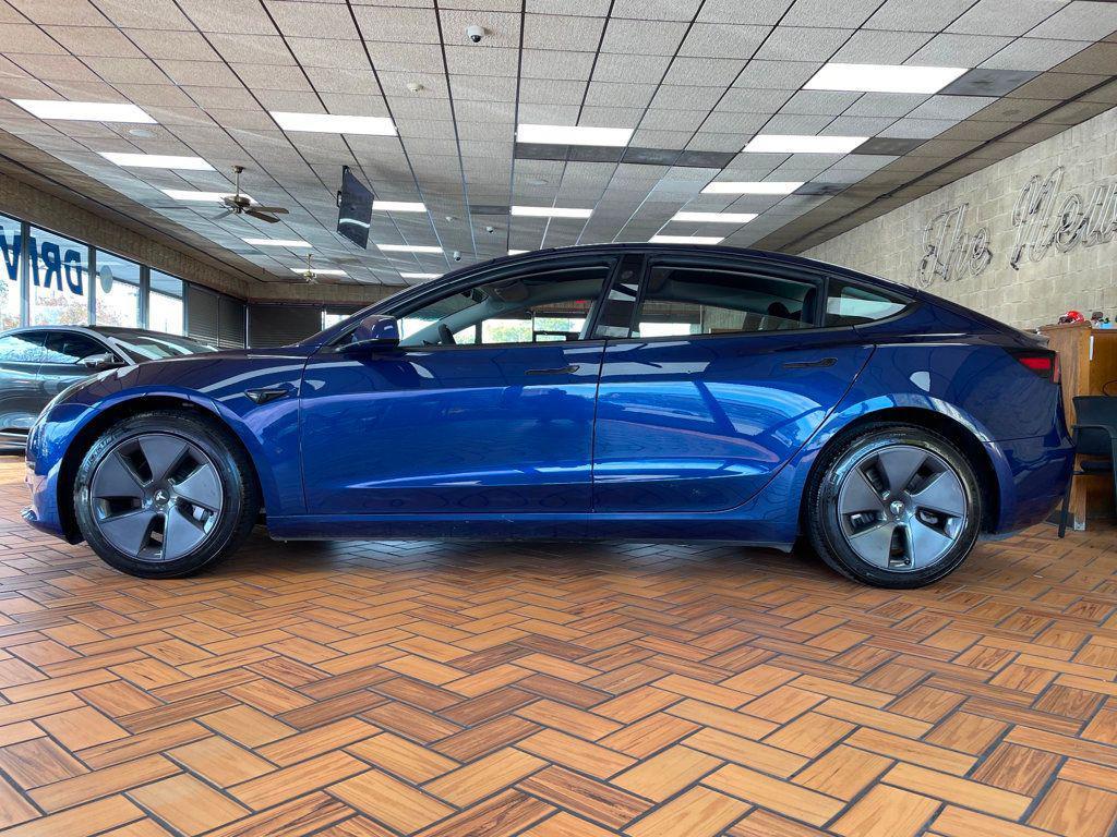 used 2023 Tesla Model 3 car, priced at $23,980