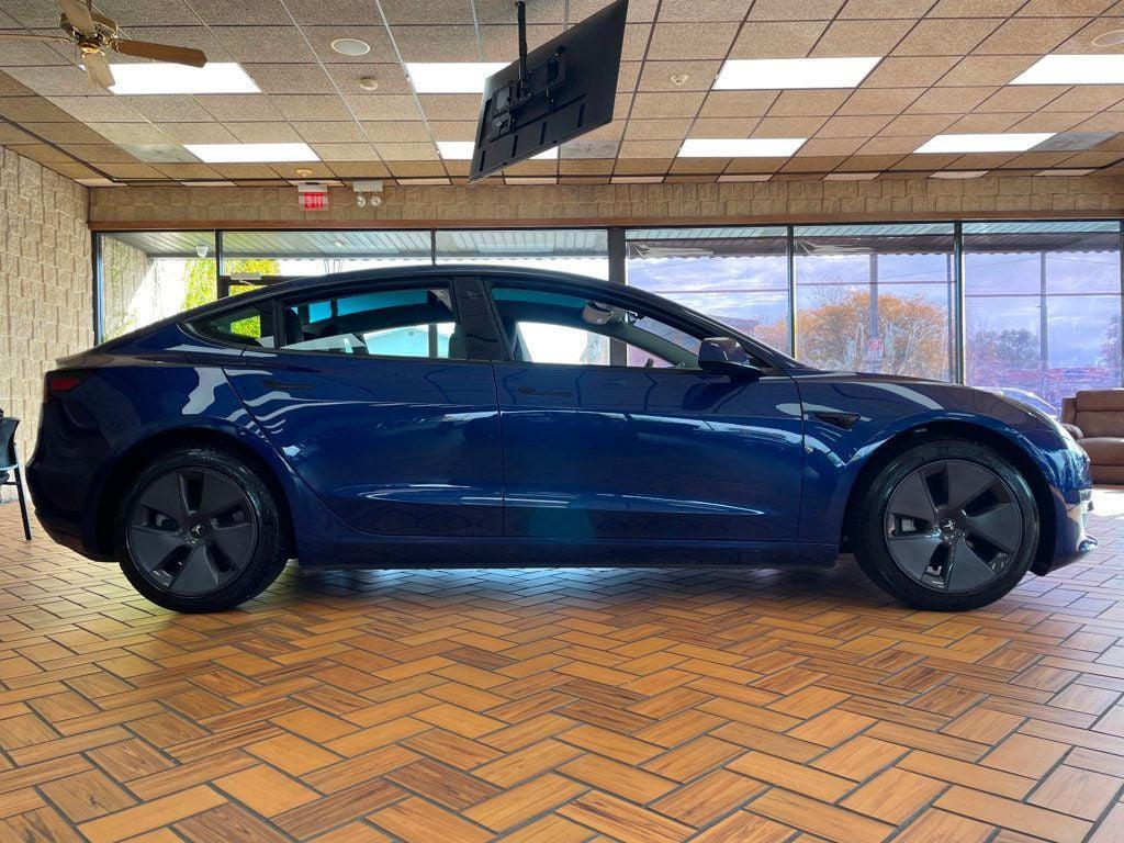 used 2023 Tesla Model 3 car, priced at $23,980