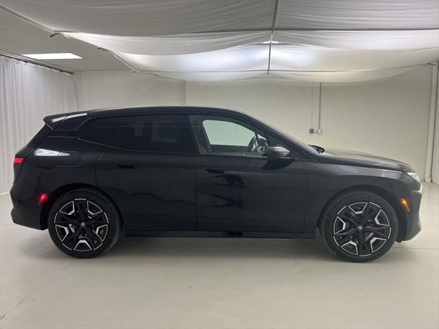 new 2024 BMW iX car, priced at $96,995