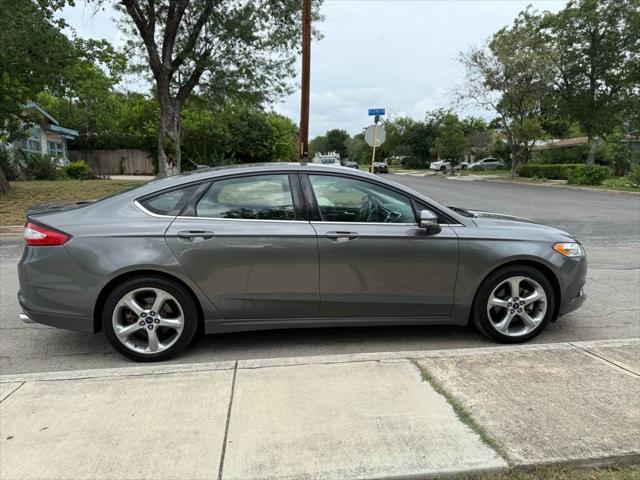 used 2014 Ford Fusion car, priced at $7,995
