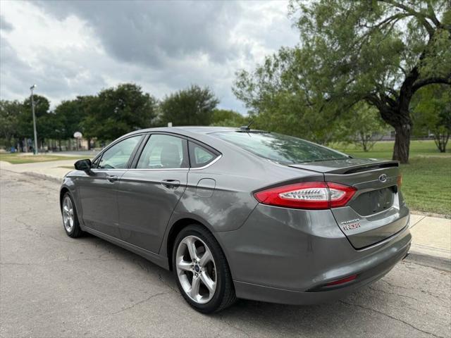 used 2014 Ford Fusion car, priced at $7,995