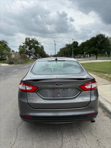 used 2014 Ford Fusion car, priced at $7,995