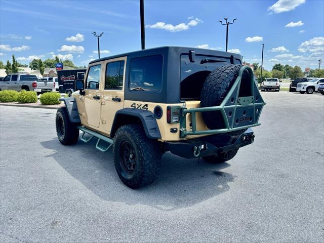 used 2013 Jeep Wrangler Unlimited car, priced at $27,944