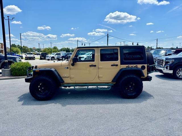 used 2013 Jeep Wrangler Unlimited car, priced at $27,944