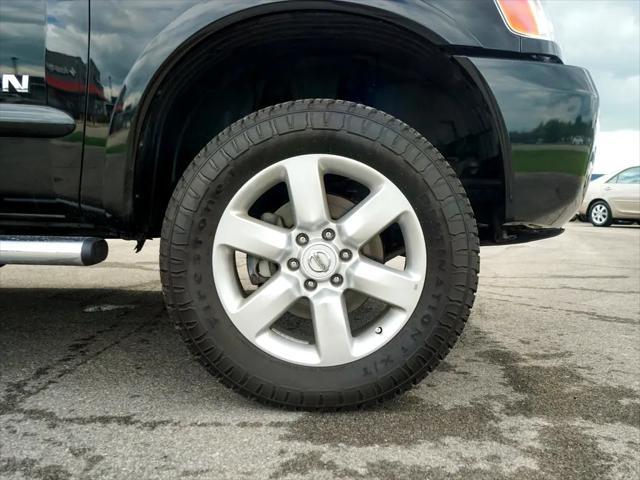 used 2015 Nissan Titan car, priced at $27,144