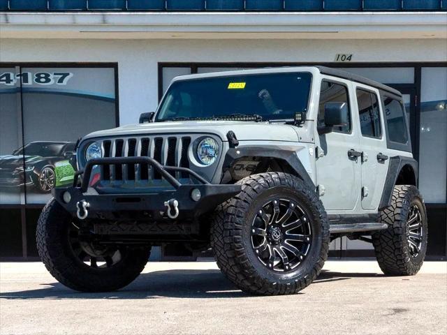 used 2018 Jeep Wrangler Unlimited car, priced at $25,744