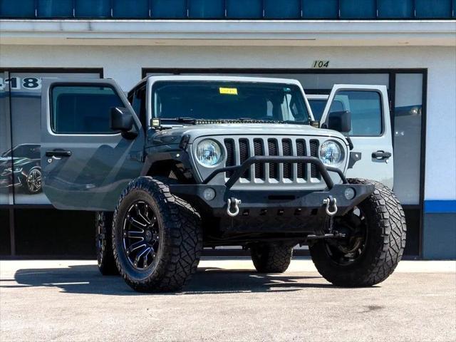 used 2018 Jeep Wrangler Unlimited car, priced at $25,744