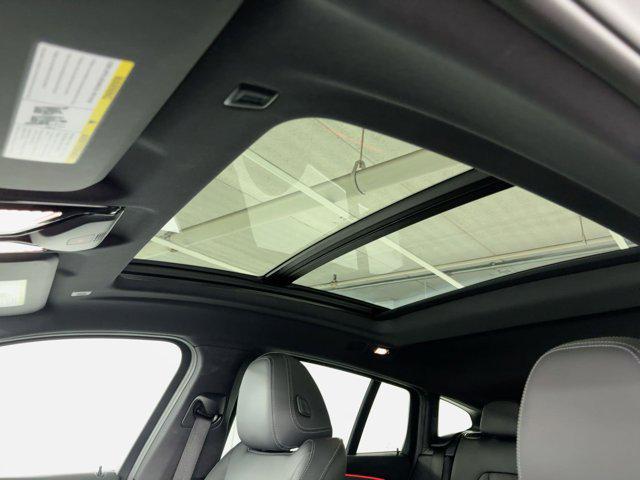 used 2023 BMW X4 car, priced at $41,397