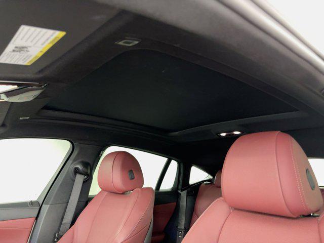 used 2022 BMW X6 car, priced at $47,899