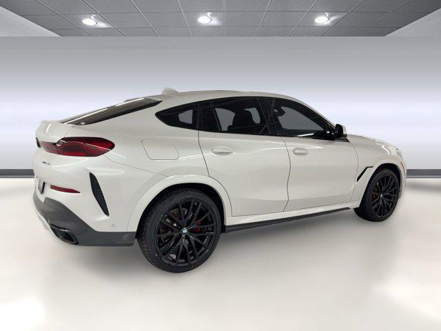 used 2022 BMW X6 car, priced at $47,899
