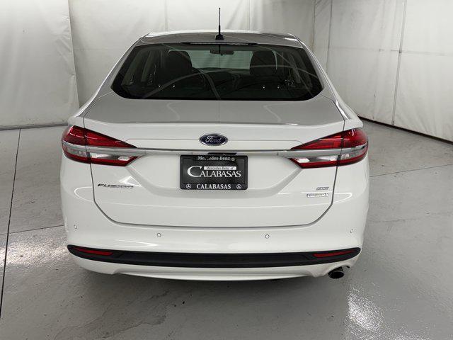 used 2018 Ford Fusion car, priced at $13,499