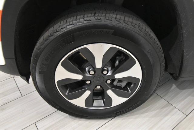 used 2023 Jeep Grand Cherokee 4xe car, priced at $29,304