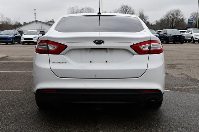 used 2014 Ford Fusion car, priced at $6,749