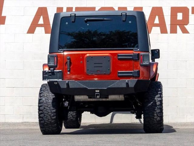 used 2014 Jeep Wrangler Unlimited car, priced at $26,744
