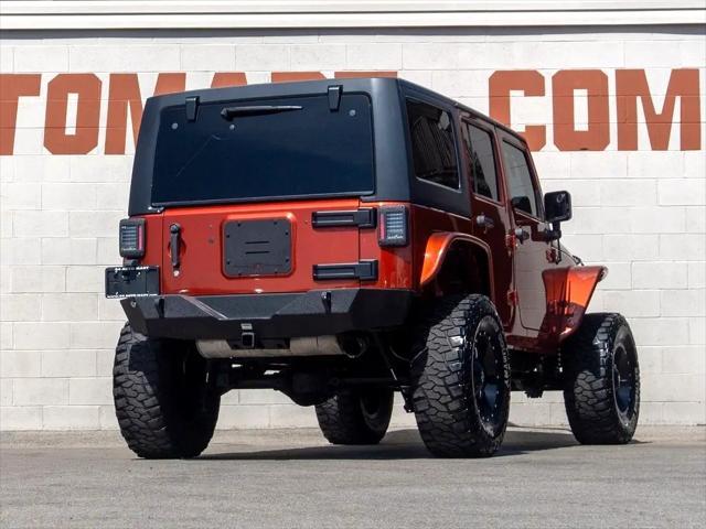 used 2014 Jeep Wrangler Unlimited car, priced at $26,744