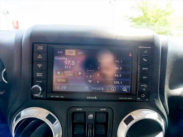 used 2014 Jeep Wrangler Unlimited car, priced at $26,744