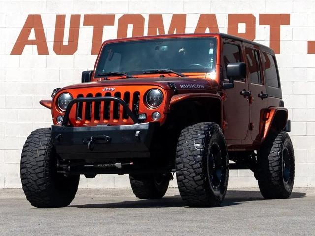 used 2014 Jeep Wrangler Unlimited car, priced at $26,744