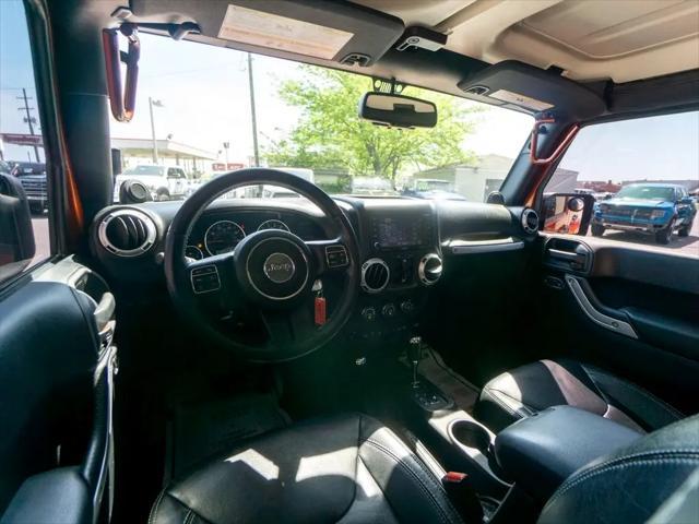 used 2014 Jeep Wrangler Unlimited car, priced at $26,744