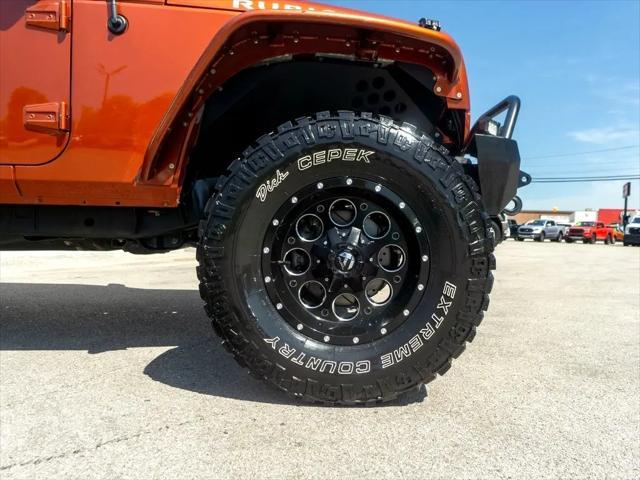 used 2014 Jeep Wrangler Unlimited car, priced at $26,744
