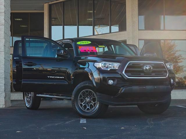 used 2018 Toyota Tacoma car, priced at $28,144