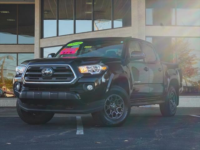 used 2018 Toyota Tacoma car, priced at $28,144