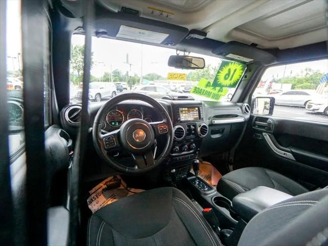 used 2016 Jeep Wrangler Unlimited car, priced at $20,944