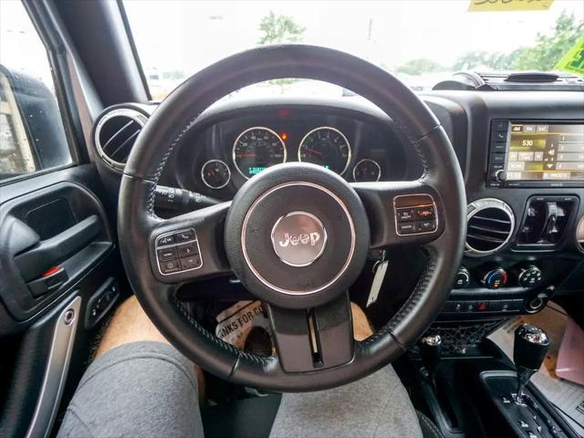 used 2016 Jeep Wrangler Unlimited car, priced at $20,944