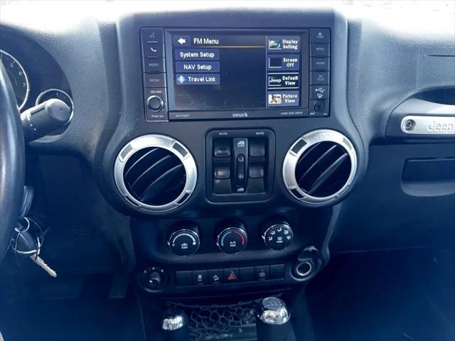used 2016 Jeep Wrangler Unlimited car, priced at $21,644