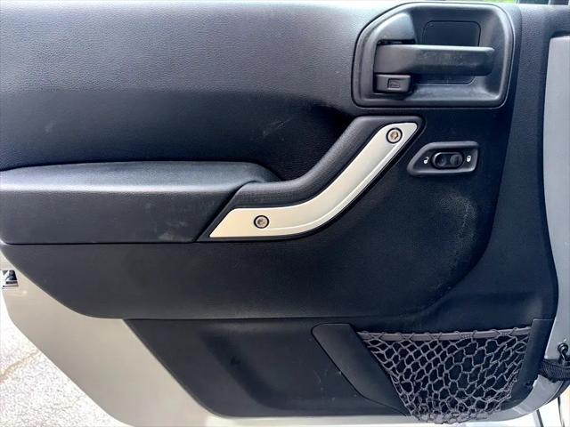 used 2016 Jeep Wrangler Unlimited car, priced at $21,644