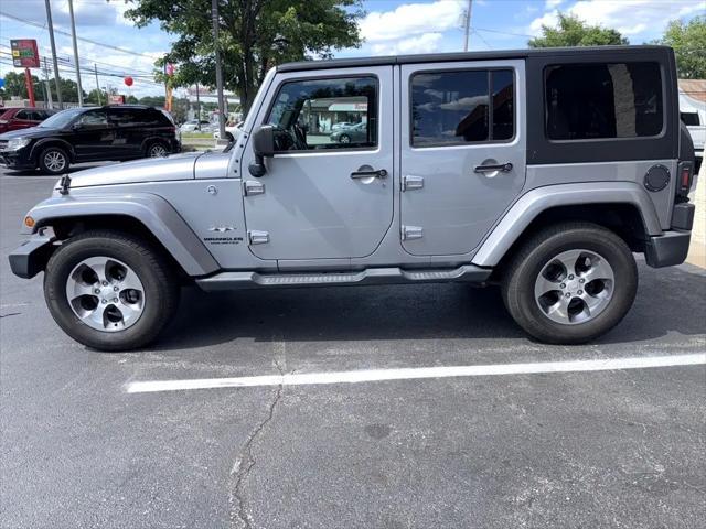 used 2016 Jeep Wrangler Unlimited car, priced at $21,644