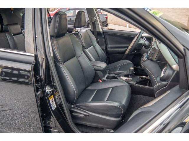 used 2014 Toyota RAV4 car, priced at $15,000